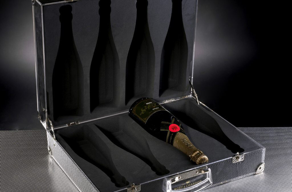 Calage sur mesure pour transporter vos bouteilles dans une mallette